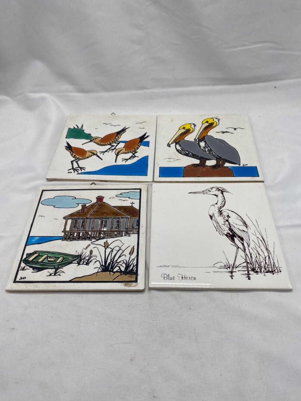 Set of 4 Mako Hand-Painted Ceramic Tile Wall Art Cork Backing Coastal Pelican